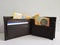 black leather wallet with Â swiss banknotes and white background